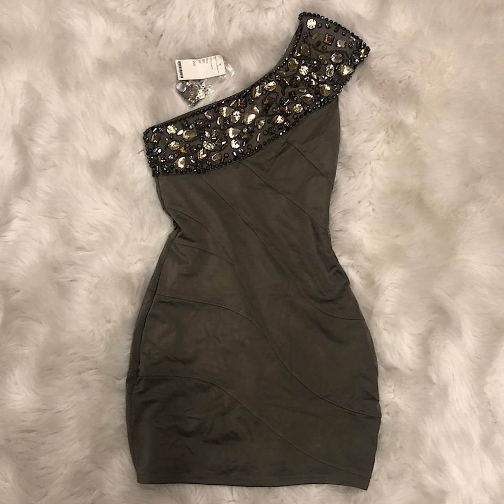 Embellished Crystal “Bebe” mini dress, right shoulder exposed.